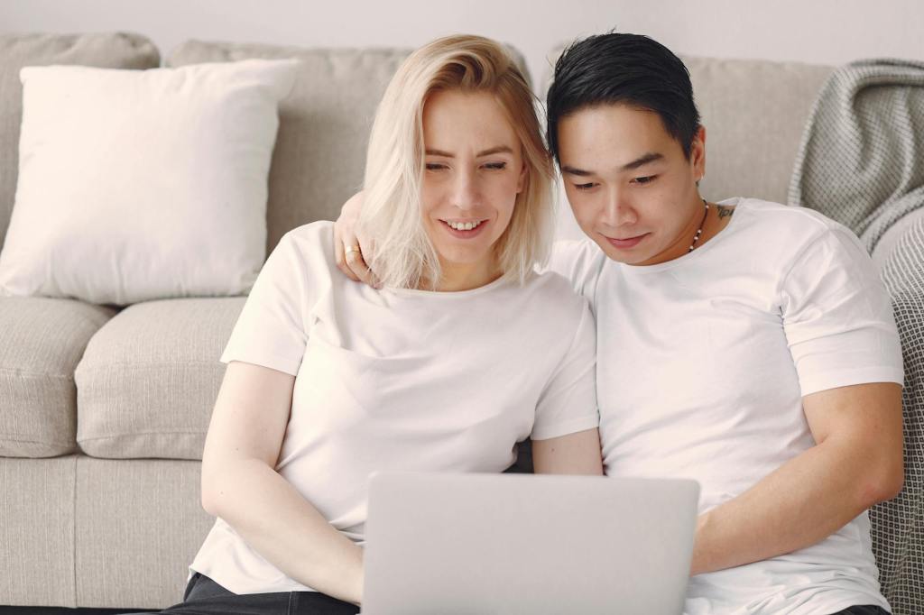 couple planning wedding at home choosing simple elopement over big wedding